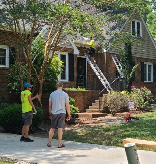 Installing 6-inch White Seamless Gutters and White Valor in Cary, NC